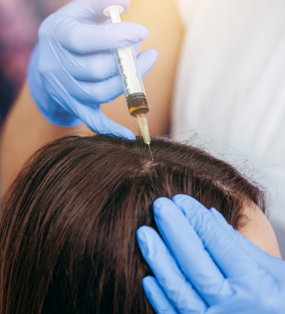 young-woman-with-hair-loss-problem-receiving-injection